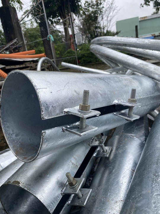 Light pole mounting bracket fabrication