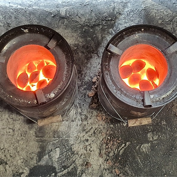 Oval coconut shell charcoal briquettes