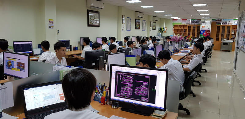 Team designing detailed technical drawings