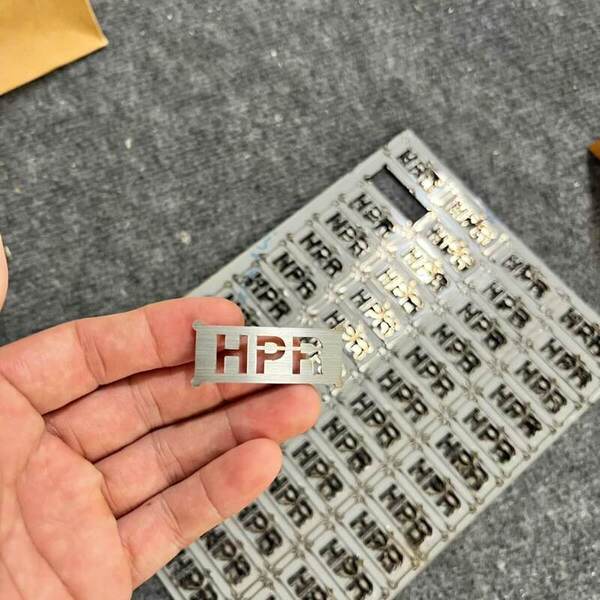 Laser-cut stainless steel labels