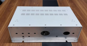 Housing with powder coating
