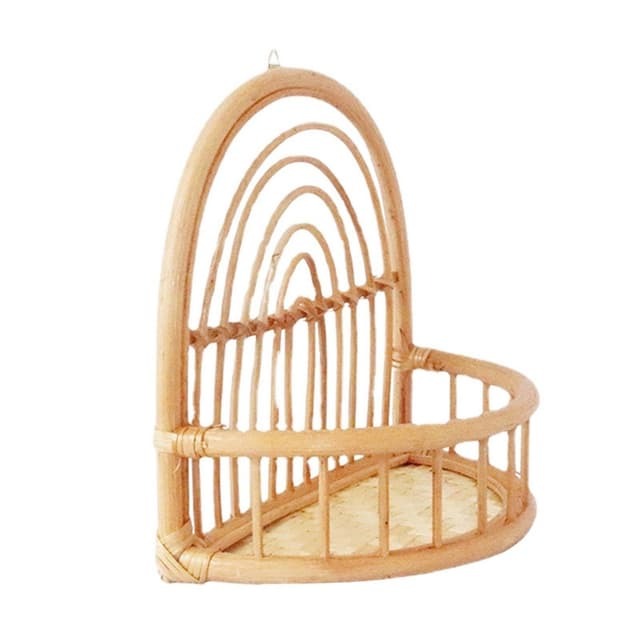 Rattan corner wall shelf with an arched back design