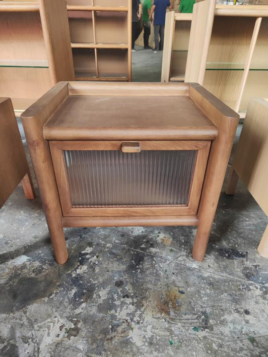 Slatted wooden bedside table