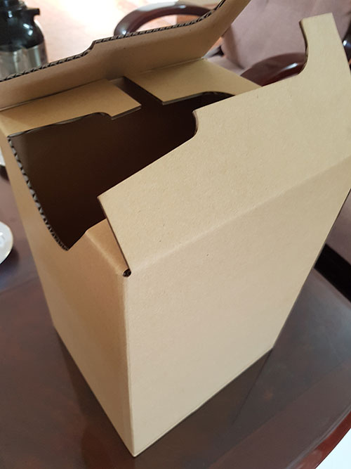 Hand hole die-cut box