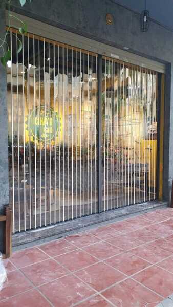 Polycarbonate side-folding accordion door
