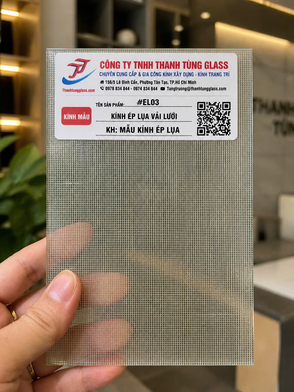 Fabric laminated glass