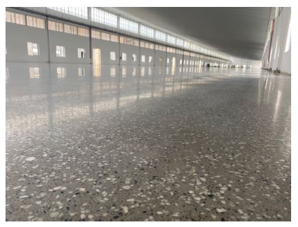Concrete densifier spraying and polishing