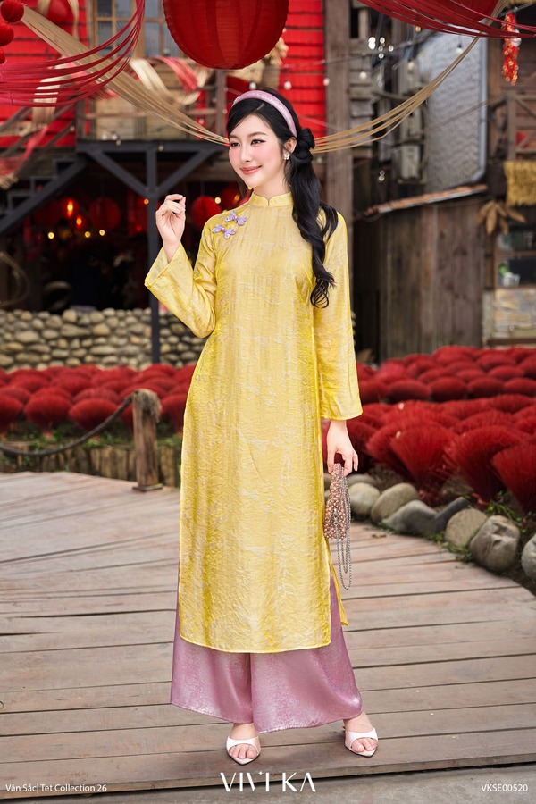 Ngoc Kim gold brocade ao dai set