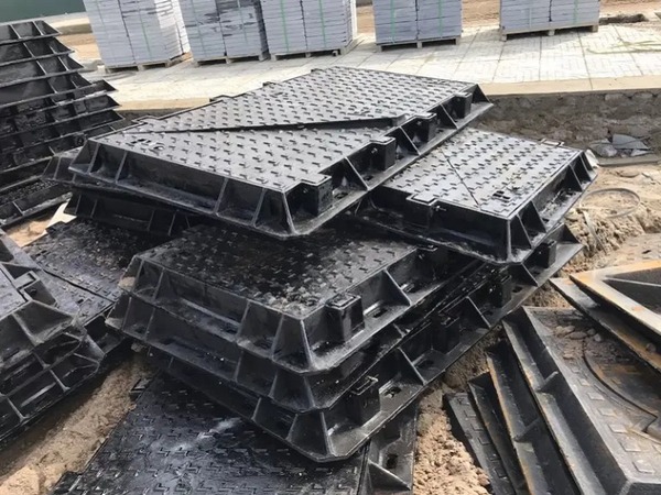 Ductile iron and composite telecom manhole covers