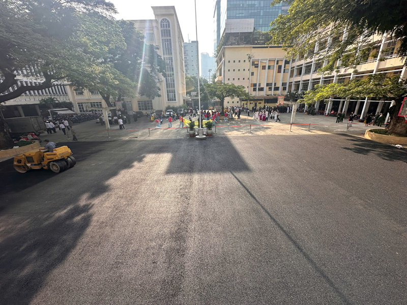Hot mix asphalt paving