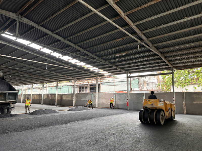 Hot mix asphalt paving