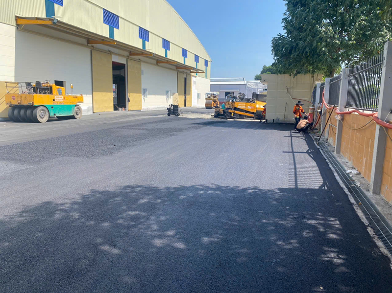 Hot mix asphalt paving